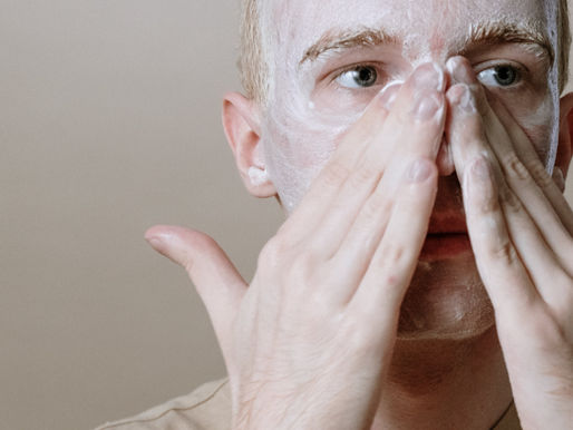 Man washing oily skin face