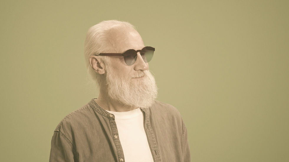 older man with beard cared for