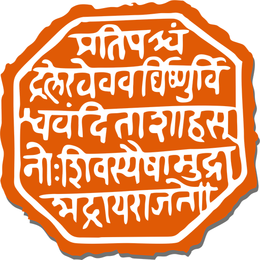 a black and orange sign with foreign writing on it