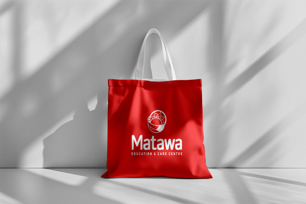 Red tote bag with "Matawa" logo and text.