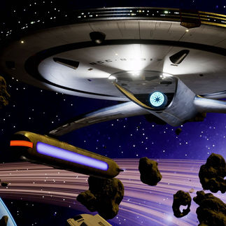 Star Trek: Resurgence starship near a planet and asteroids