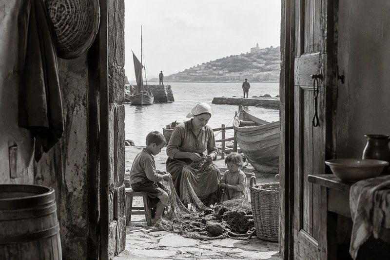 Families During A Candid Moment During The Main Action In A Coastal Community...
