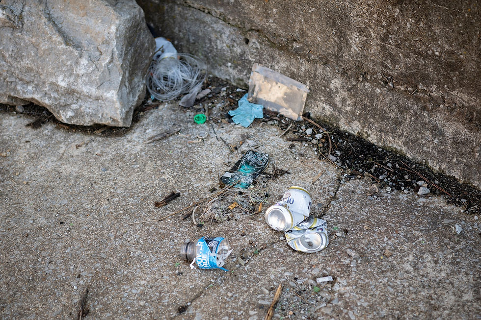 Trash is found scattered along a training wall of the Elk River Dam on Arnold Air Force Base, Tenn., January 28, 2025. Work is set to soon begin to prevent public access to the dam structure through the installation of security fencing around the downstream training walls. The effort is to ensure property security and safety in the area. The river will still be accessible to recreationalists for fishing and other activities. (U.S. Air Force photo by Keith Thornburgh)