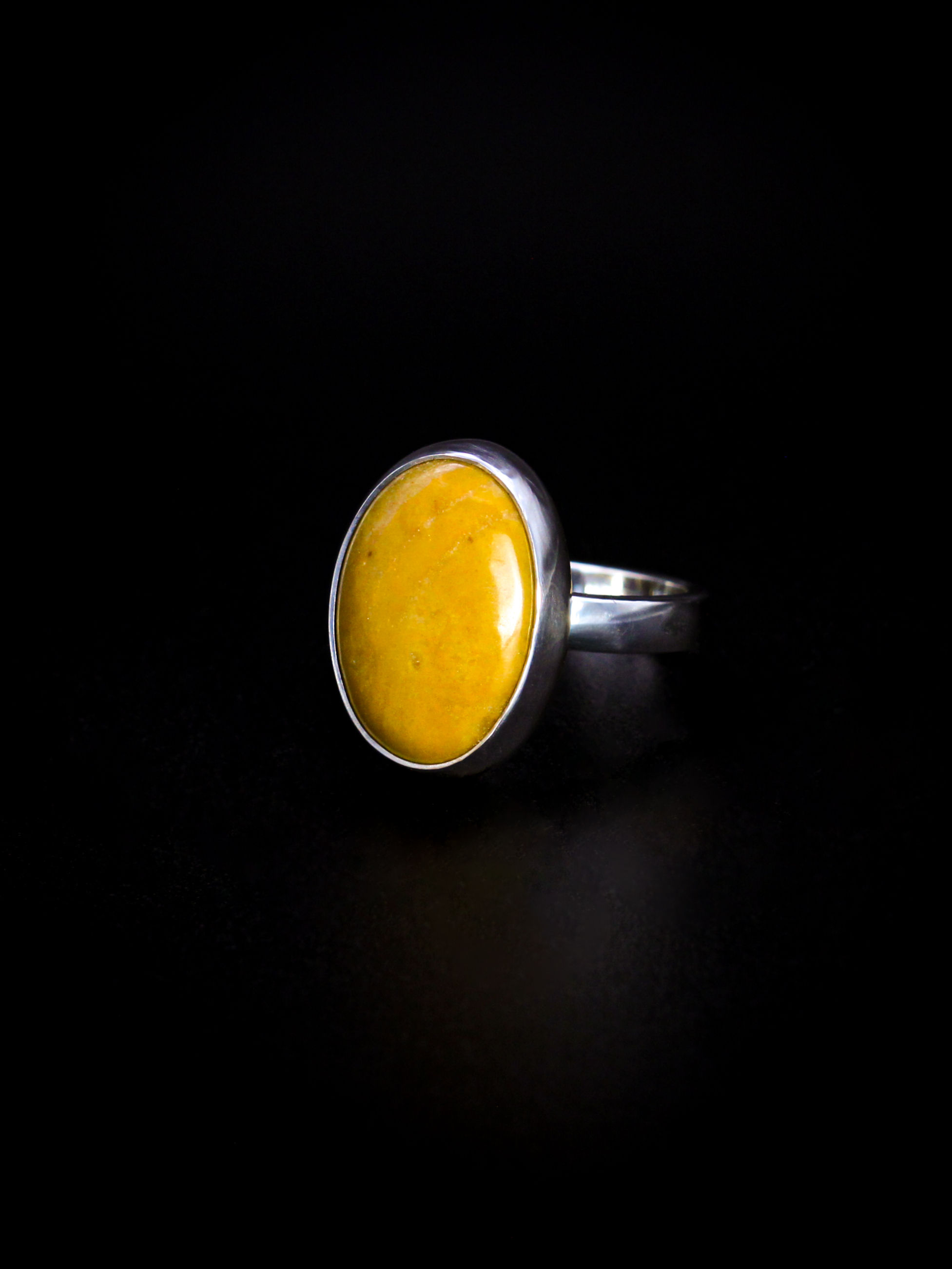 Yellow oval Travertine stone set in clean smooth sterling silver bezel from decembermoonjewelry.com