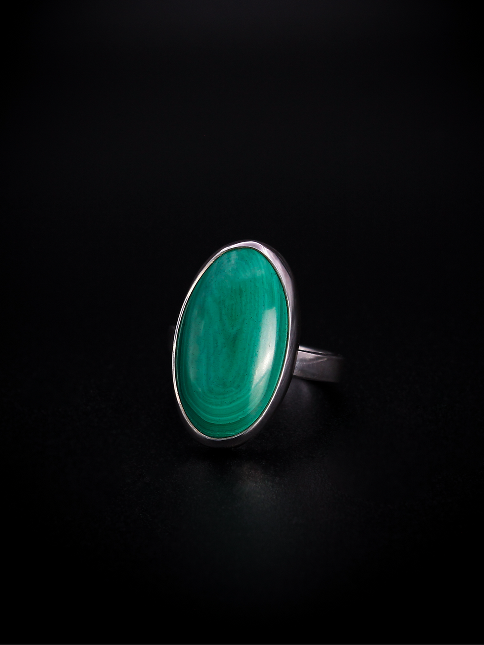 Green malachite stone set in sterling silver ring