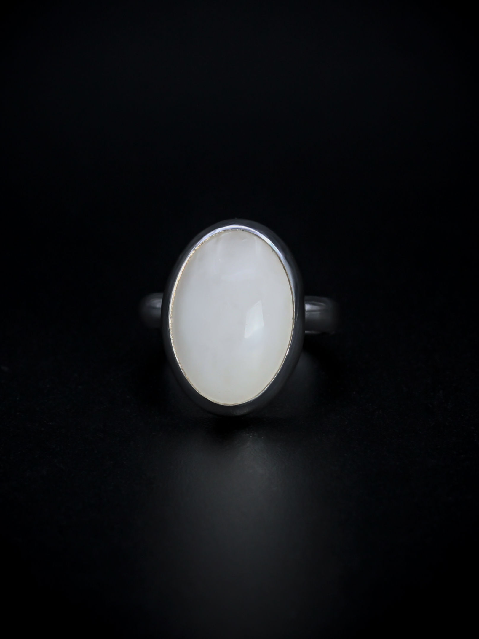 Oval white quartz sterling silver ring front view