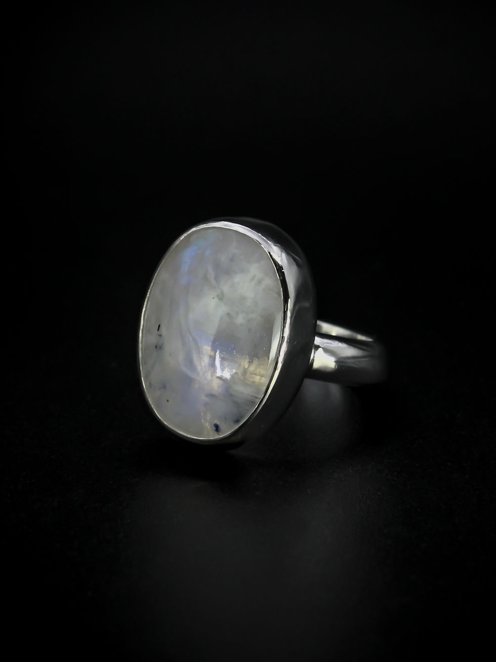 Thumbnail: white stone set in argentium silver ring