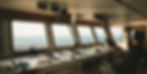 Interior of a yacht control room used for bespoke surf and dive trips at sea