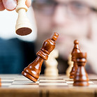 Strategic game with a chessboard and pawns