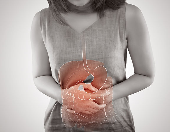 digital-composite-midsection-woman-with-stomachache.jpg