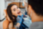 young-female-patient-visiting-dentist-office_496169-930.jpg