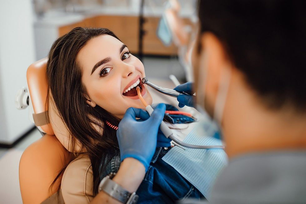young-female-patient-visiting-dentist-office_496169-930.jpg