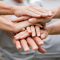 Hands Stacked Together_edited.jpg