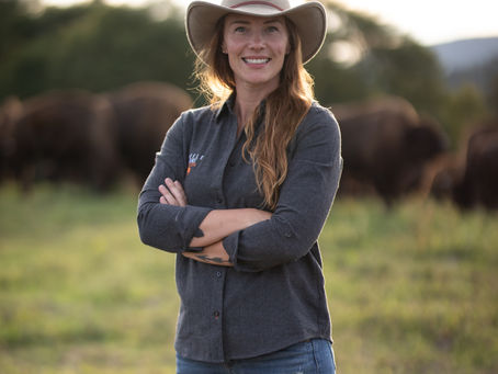 Country Roads Cowgirl showcasing bison ranch