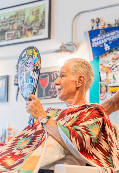 Older client haircut at Good Times at The Hideout Barbershop in El Sereno.