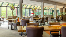 Postillion Hotel Arnhem - restaurant seating area
