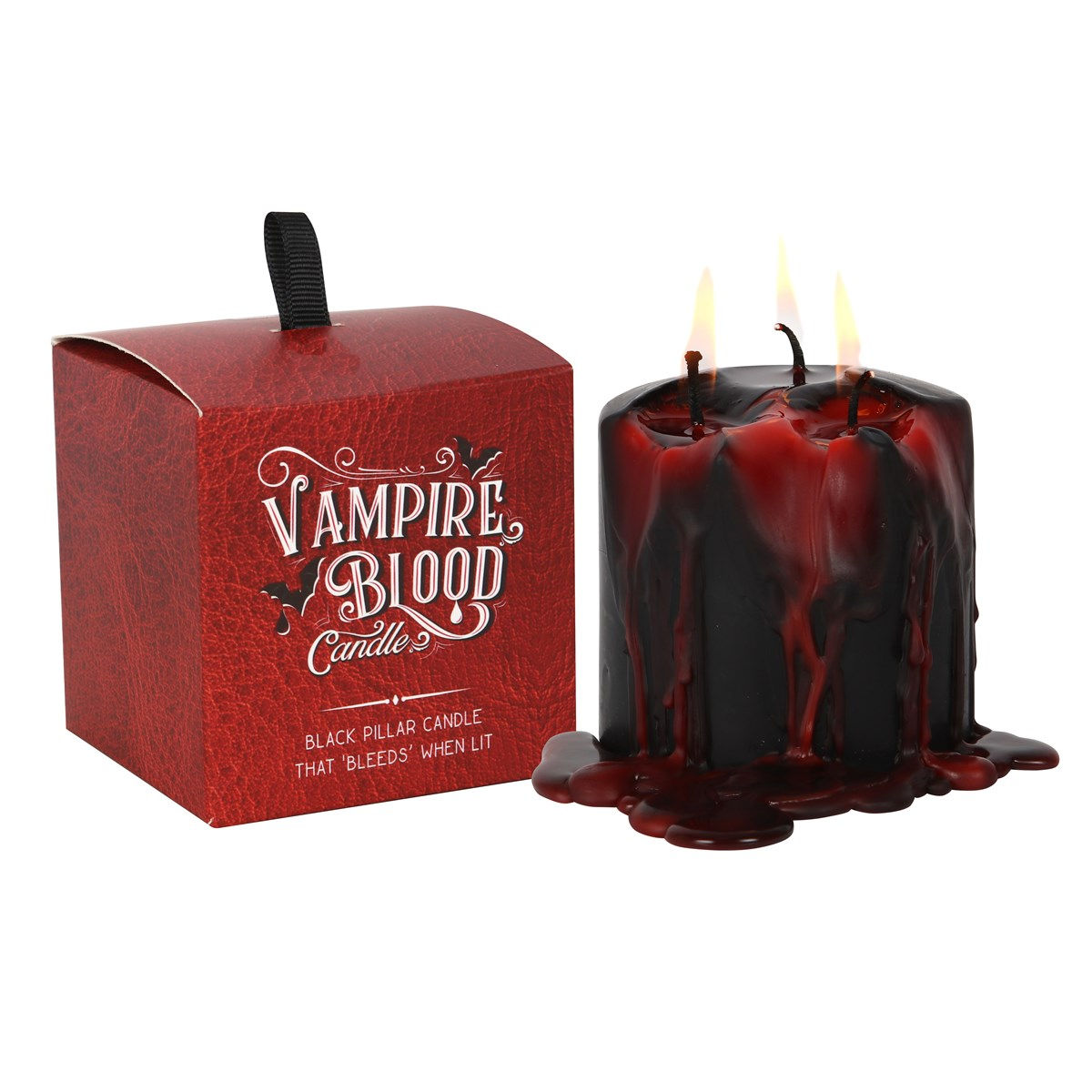 Vampire Blood candle with red wax drips beside its box
