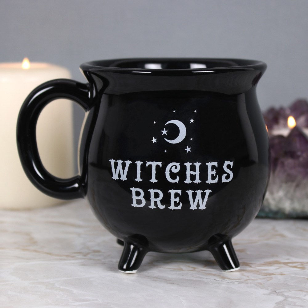 Witches Brew cauldron mug with moon and stars design