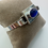 Thumbnail: Cat’s Eye Blue Glass Silver Bangle