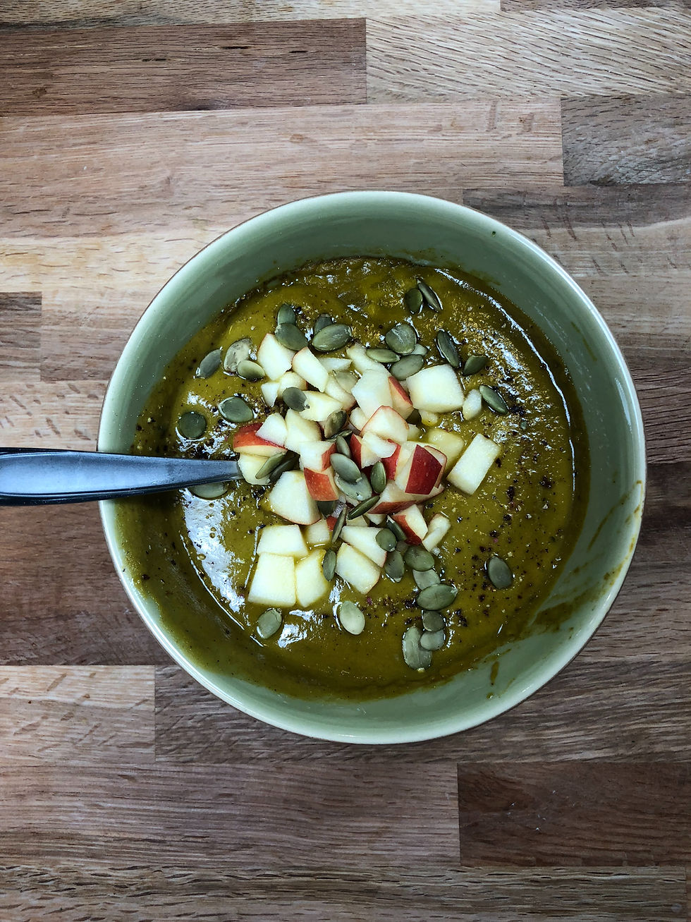 squash soup with apples and pumpkin seeds