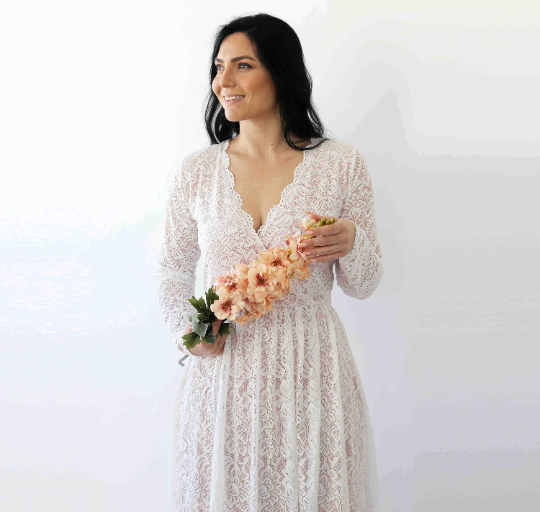 Miniatura: Elfenbeinfarbenes Hochzeitskleid mit Taschen