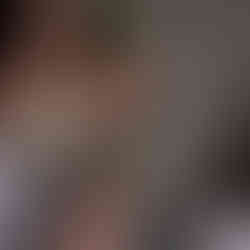 woman hammering ring on mandrel at rebecca oldfield jewellery making workshops