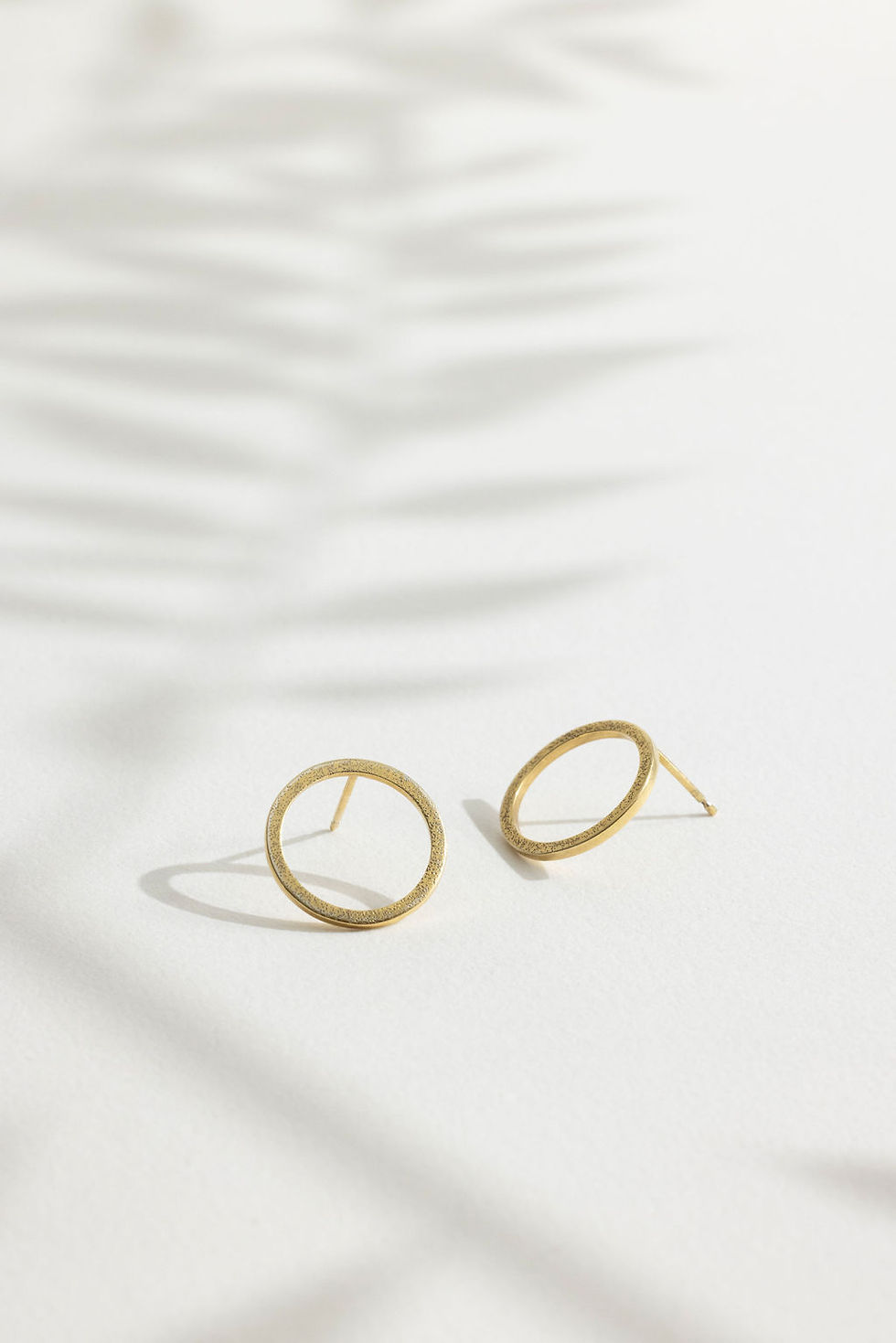 Thumbnail: gold vermeil circle ear studs by Rebecca Oldfield Jewellery
