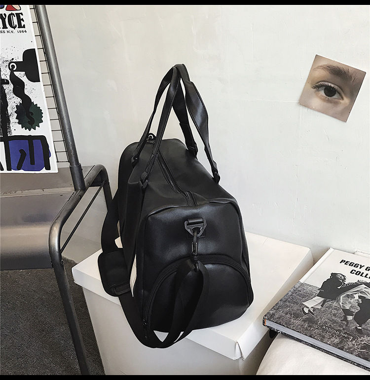 Thumbnail: Functionality and style with our black traveling and sport bag