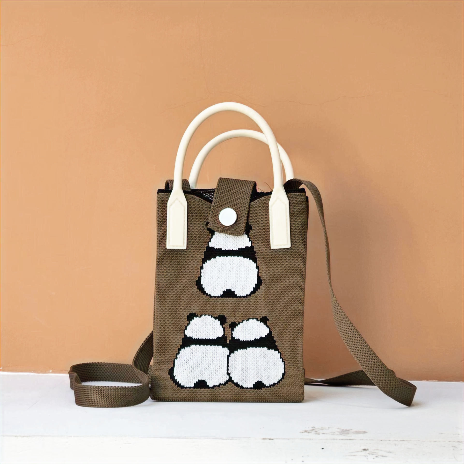 Three playful pandas artful back phone bag