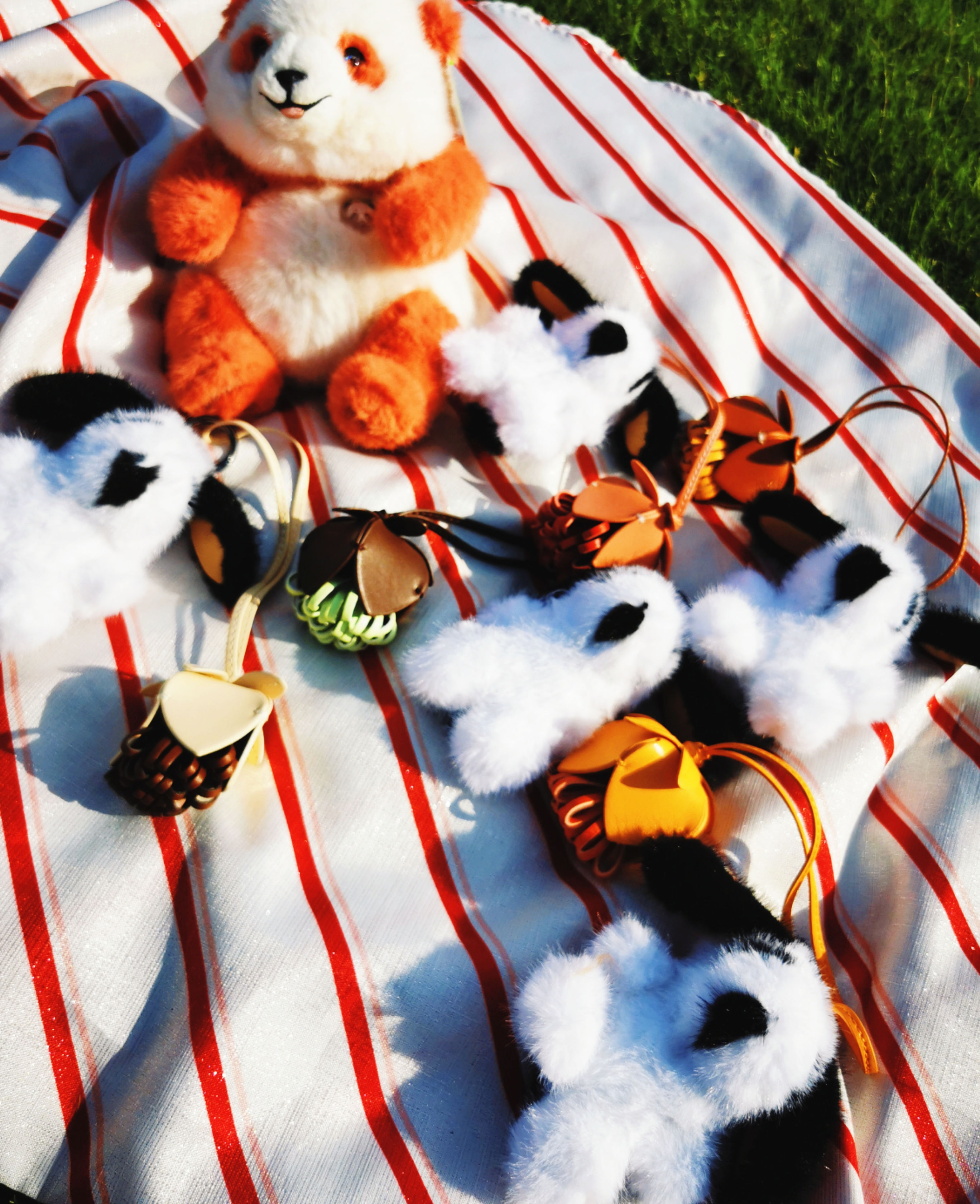 Our Exclusive Hairy Pup Plush with Handmade Leather Flower Charm