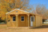 Derksen-Treated-Deluxe-Cabin-FeaturedIMG-e1713460796529.jpg