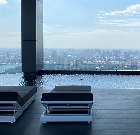 Pool chairs, sky pool at canapaya riverfront, tallest buildings in thailand, river view, rama 3 condo, luxury condos in bangkok, outdoor swiming pool, sky pool