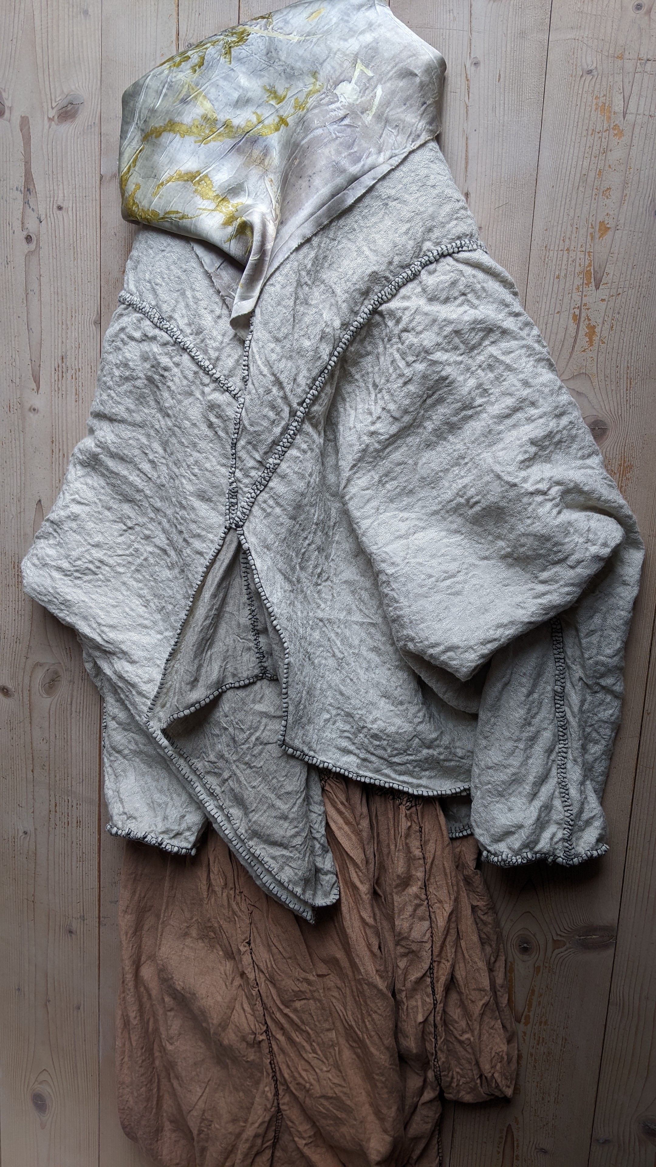 oluhi, hand sewn clothing, plant dyes, natural dyes, botanical dyes, botanical prints, compostable fabrics, natural dyes, handmade clothing, oluhi, hand stitched garments, hand stitching, hand stitched, hand stitched jacket, hand stitched dress
