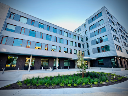 Nigel House multi-residential building with landscaping in Saanich