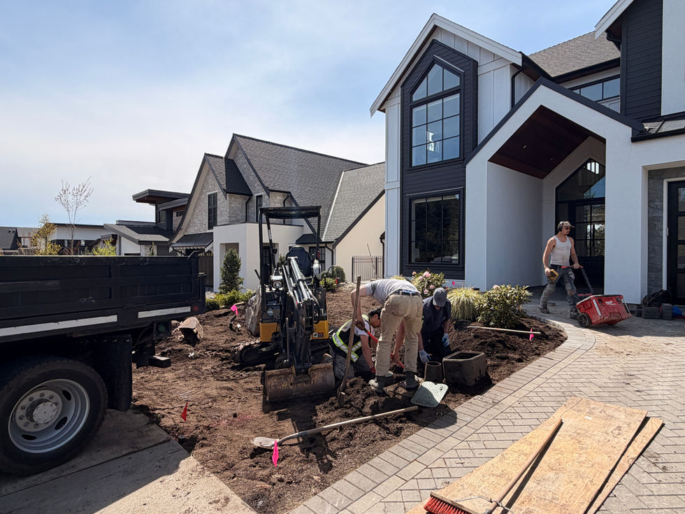 Modern house with landscaping in progress.