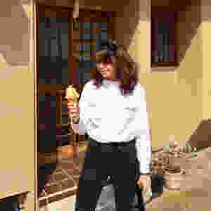 Nina posing with an ice-cream.