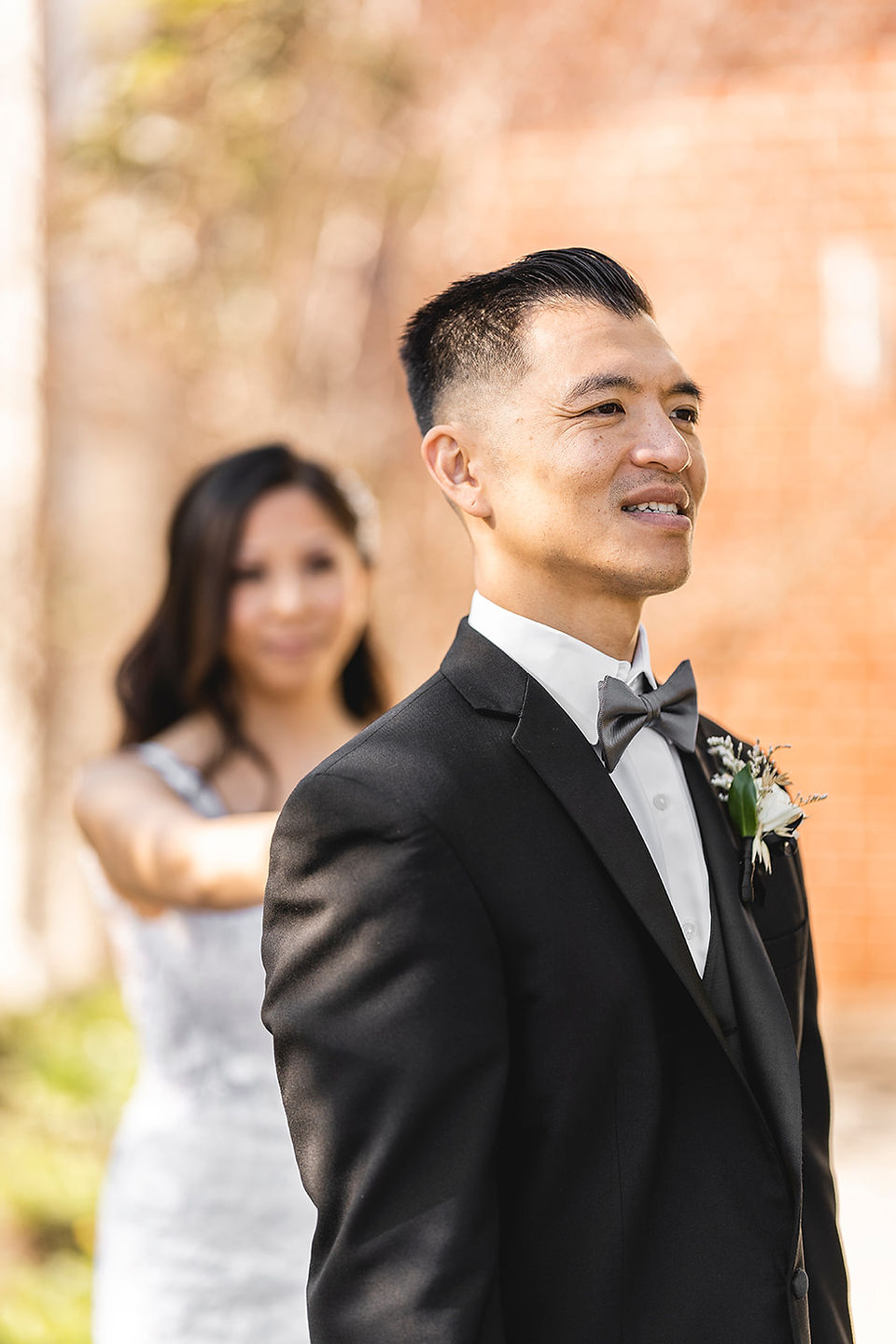 Bride and groom first look for A Full Day of Wedding Celebrations, from a Vietnamese tea ceremony/Viet wedding to a Catholic Church wedding ceremony, shot by Paper Birch Collective, Orange County Wedding Photographer
