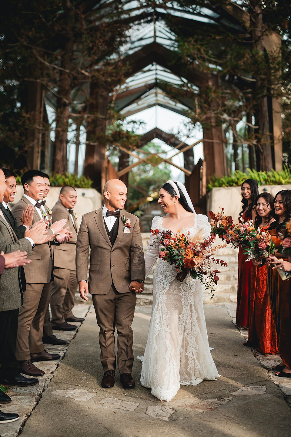 Newly weds with their wedding party at Wayfarers Chapel in Palos Verdes captured by Alvis Pham Photography, Orange County California Wedding Photographer