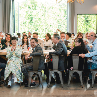 Guests laugh during speech at The Harper in Costa Mesa by Alvis Pham Photography, Orange County California Wedding Photographer
