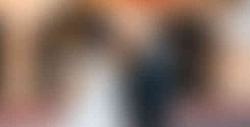 Newly weds take a stroll at the Arlington Theater shot by Alvis Pham Photography, Orange County California Wedding Photographer