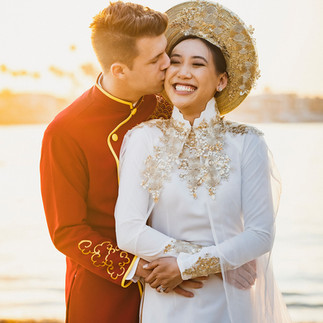 Groom kisses bride's cheek for newly wed photoshoot at Newport Beach shot by Paper Birch Collective, California Wedding Photographer in Orange County