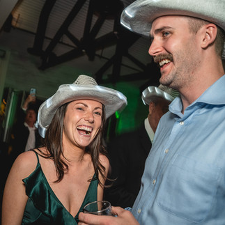 Man and woman dance at The Barn at Aliso Viejo Ranch reception by Paper Birch Collective, California Wedding Photographer in Orange County