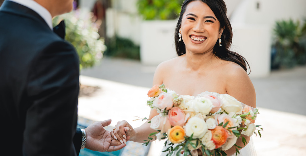 Bride smiling during the first look at Villa and Vine in Santa Barbara shot by Alvis Pham Photography, Orange County California Wedding Photographer