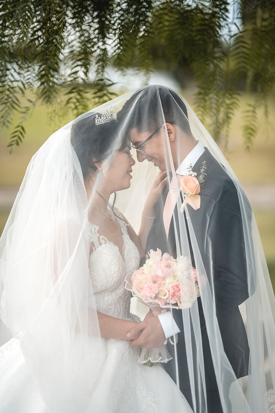 Socal Wedding romantics shot of Bride + Groom under veil by Paper Birch Collective, orange county wedding photographer