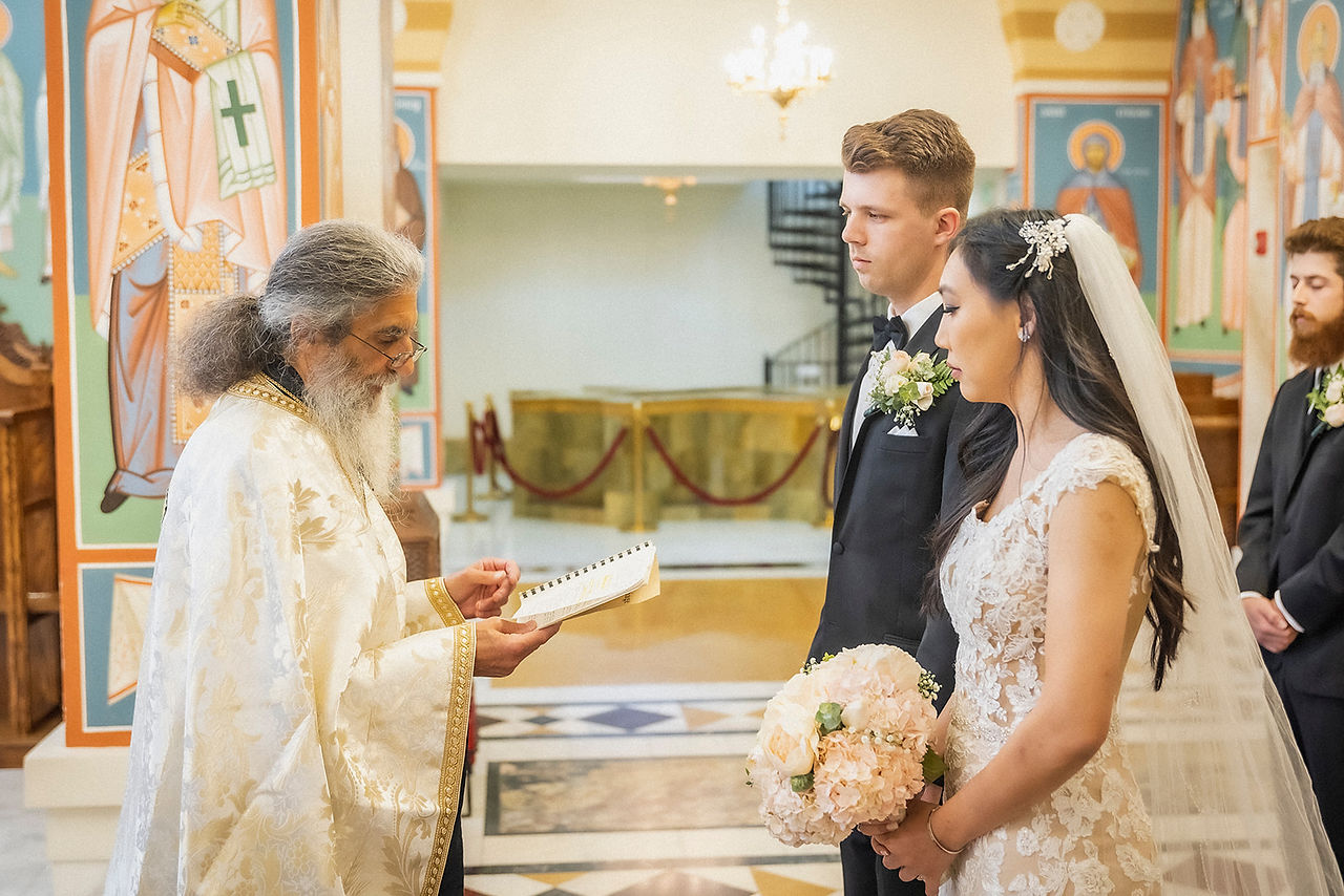 Bride and groom during wedding church ceremony shot by Paper Birch Collective, California Wedding Photographer in Orange County
