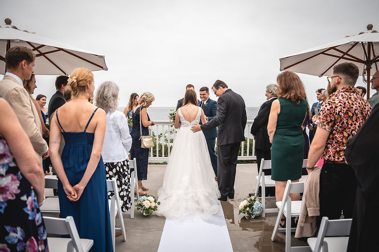 Father sends off bride at Wedding Ceremony at Occasions at Laguna Village in Laguna Beach photo by Paper Birch Collective, California Wedding Photographer in Orange County