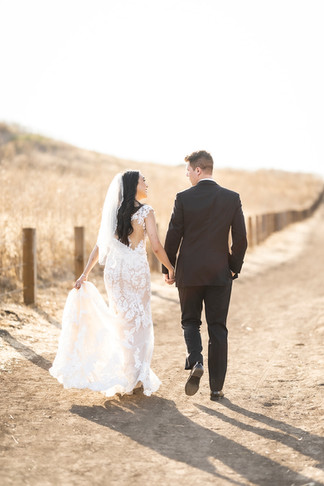Newly weds walk at Quail Hill Trailhead shot by Paper Birch Collective, California Wedding Photographer in Orange County
