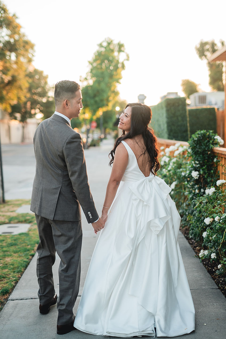 Newly weds walk together to reception at The Richland photo by Alvis Pham Photography, Orange County California Wedding Photographer