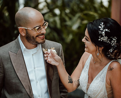 Bride and groom smiling and staring at each other