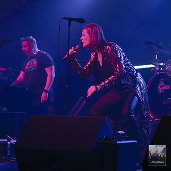 Female vocalist performing on an independent artist roster.